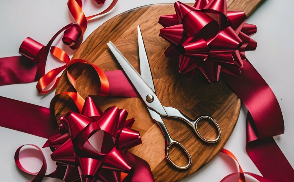 scissors-near-red-bows-ribbon