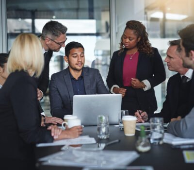 business-people-problem-solving-laptop-meeting-teamwork-partnership-collaboration-office-planning-talking-group-discussion-feedback-brainstorming-project-corporate Business people, problem solving or laptop in meeting for teamwork, partnership and collaboration in office. Planning, talking or group discussion for feedback, brainstorming or project in corporate.