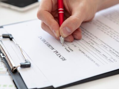 high-angle-man-signing-contract-new-house