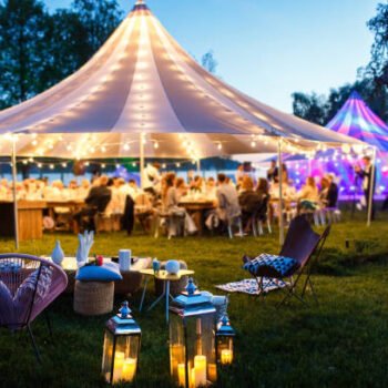 Colorful wedding tents at night. Wedding day.